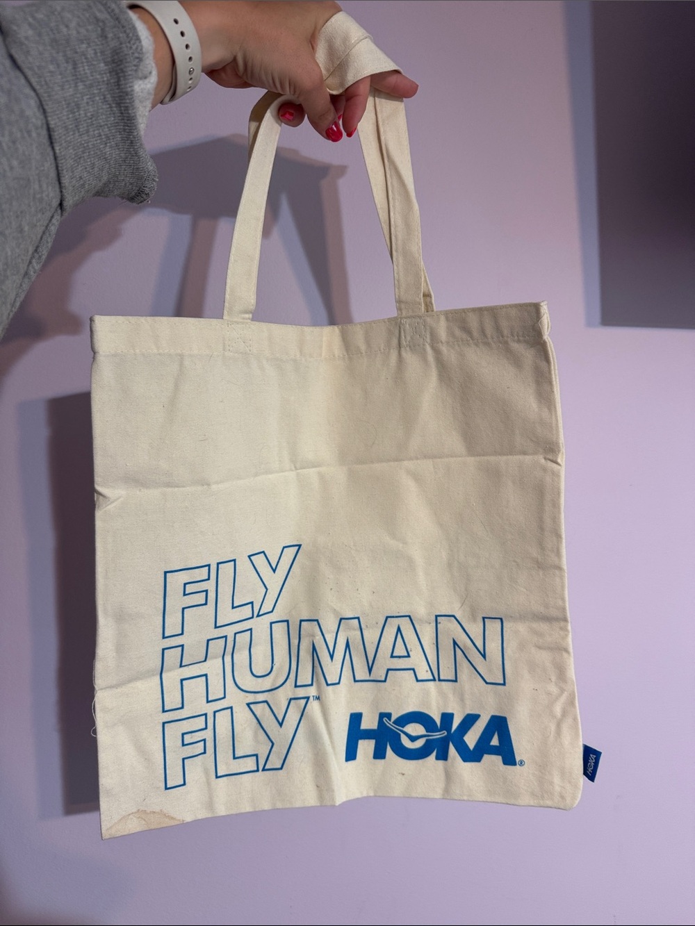 Hoka Cream Canvas Tote with Blue Logo and 'FLY HUMAN FLY' Print